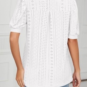 Elegant fashionable women's white blouse with short sleeves and embellishments